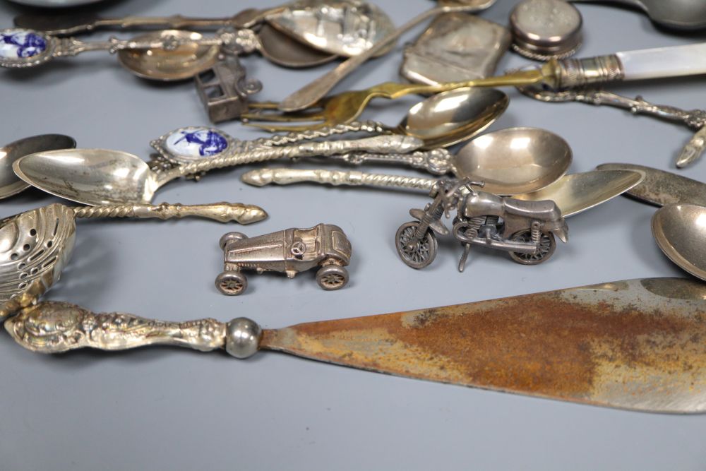 A silver sugar bowl and cream jug, a pair of nut dishes and sundry small silver